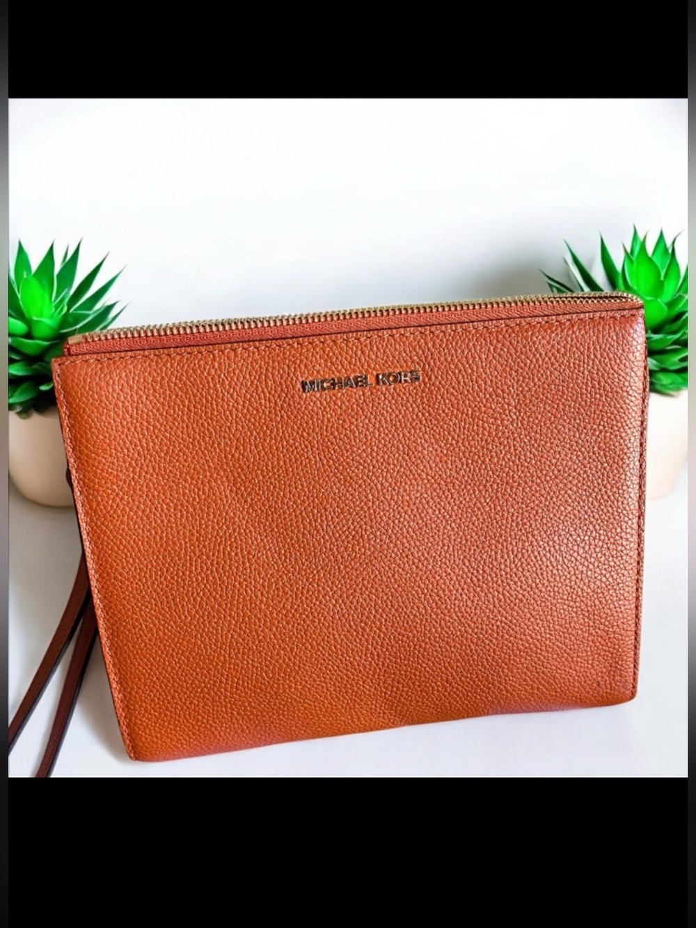 Michael Kors XL pebble leather clutch wrislet in burnt orange EUC no callouts